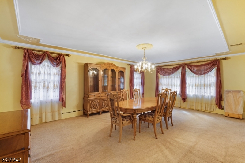 312 Naughright Road Long Valley, NJ 07853 - Photo 9 of 32 a dining room with furniture and window