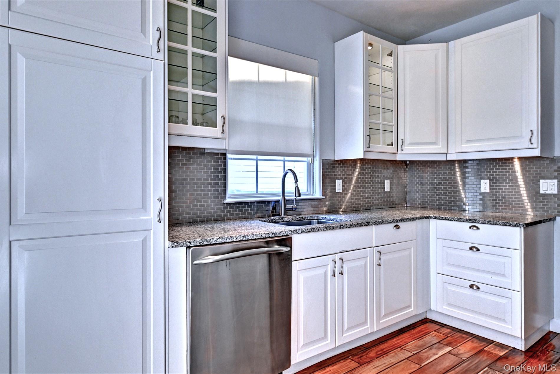 530 Leisure Drive Ridge, NY 11961 - Photo 11 of 26 Stainless Steel Newer Appliances, Granite Counters, Tile Backsplash