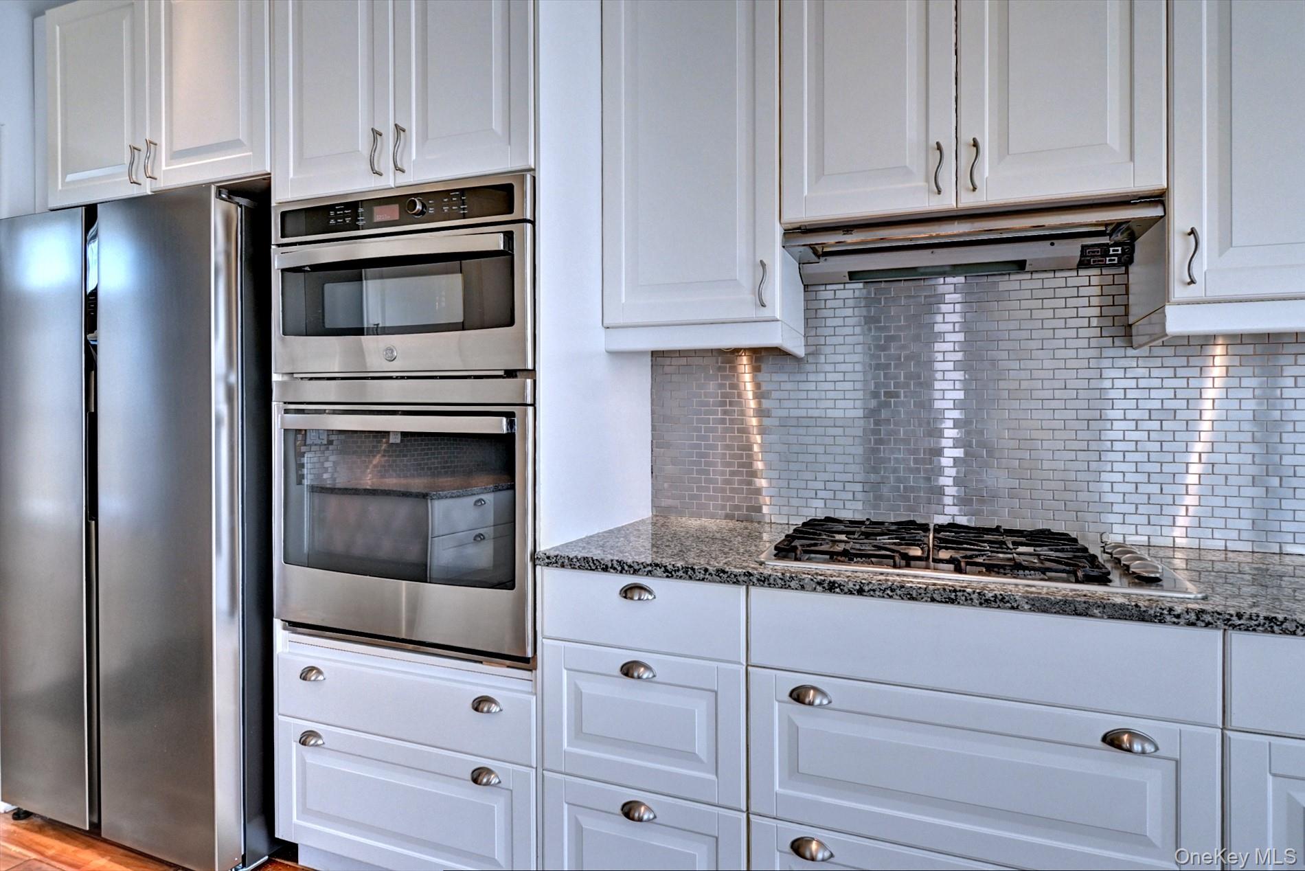 530 Leisure Drive Ridge, NY 11961 - Photo 12 of 26 Built in Pantry, Stainless Natural Gas Cooktop, Wall oven and Refrigerator