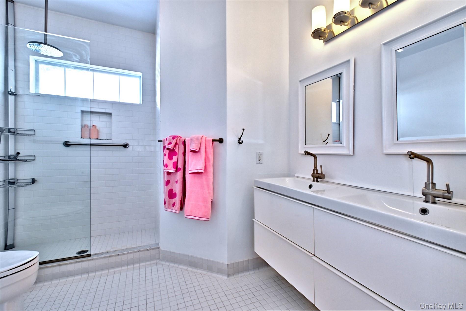 530 Leisure Drive Ridge, NY 11961 - Photo 18 of 26 Totally Updated Primary Bath with Oversized Easy Walk in Shower w/frameless Shower Doors