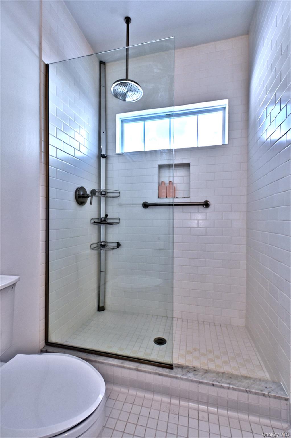 530 Leisure Drive Ridge, NY 11961 - Photo 20 of 26 Newer Updated Shower w/White Tile and Custom Hardware