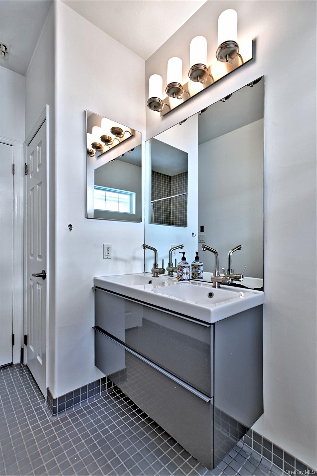 530 Leisure Drive Ridge, NY 11961 - Photo 22 of 26 Totally Updated Guest Bath with Two Sinks on the Custom Vanity