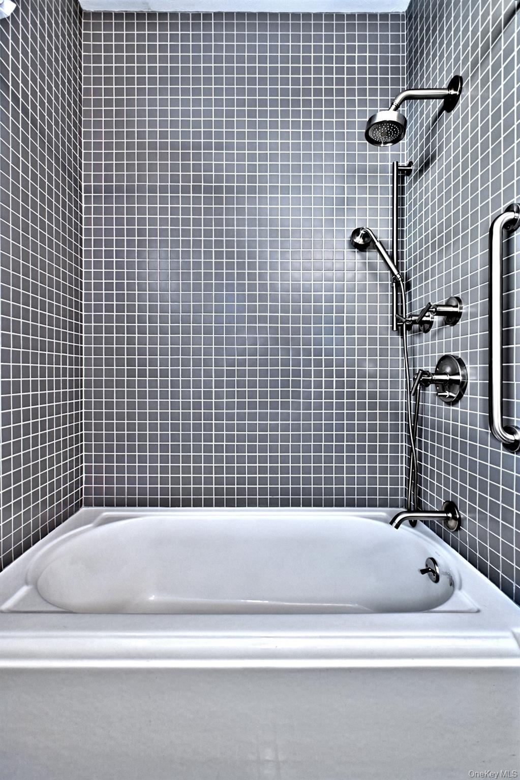 530 Leisure Drive Ridge, NY 11961 - Photo 23 of 26 Deep Garden Tub, Tile Surround and Custom Hardware