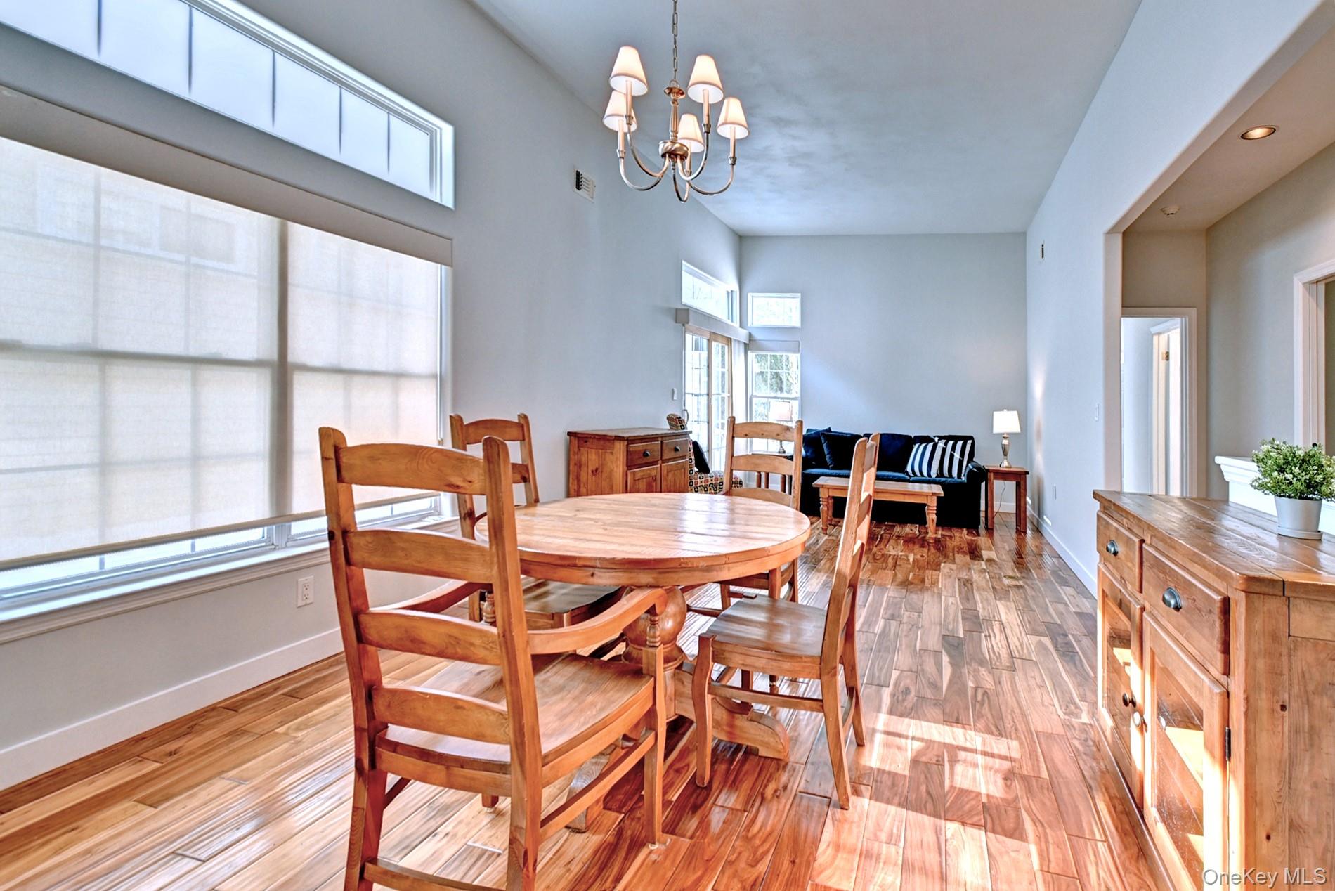 530 Leisure Drive Ridge, NY 11961 - Photo 26 of 26 Open Floor Plan Living Room and Dining Room