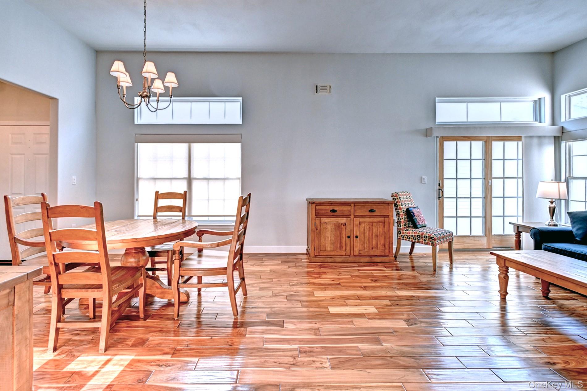 530 Leisure Drive Ridge, NY 11961 - Photo 7 of 26 Sunlit Home with Lots of Windows and Slider to the Patio