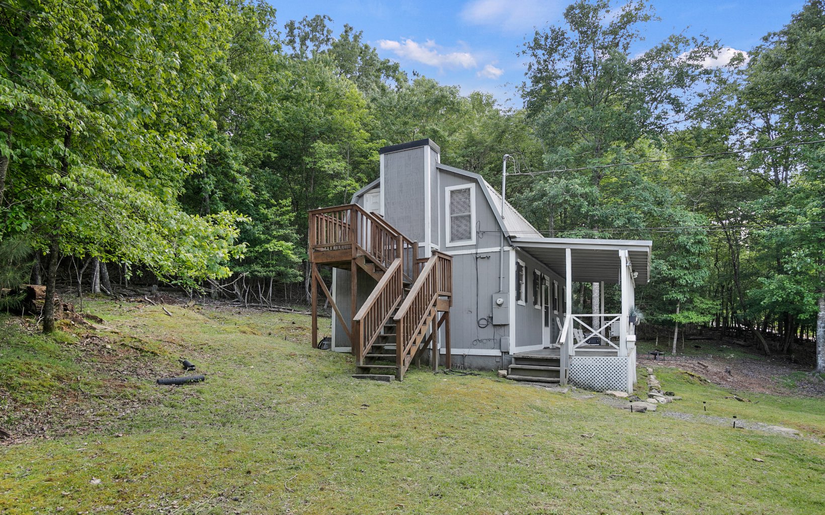12 Rose Court Ellijay, GA 30540 - Photo 15 of 34 a view of a house with backyard