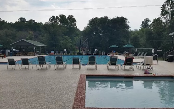 12 Rose Court Ellijay, GA 30540 - Photo 26 of 34 a view of a lake with chairs