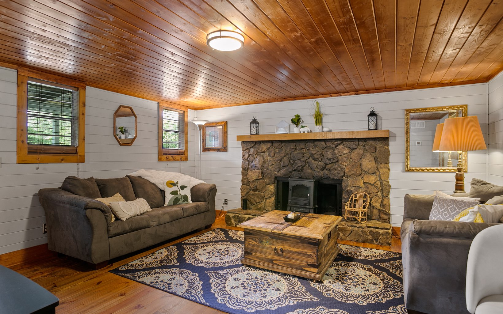 12 Rose Court Ellijay, GA 30540 - Photo 4 of 34 a living room with furniture and a fireplace