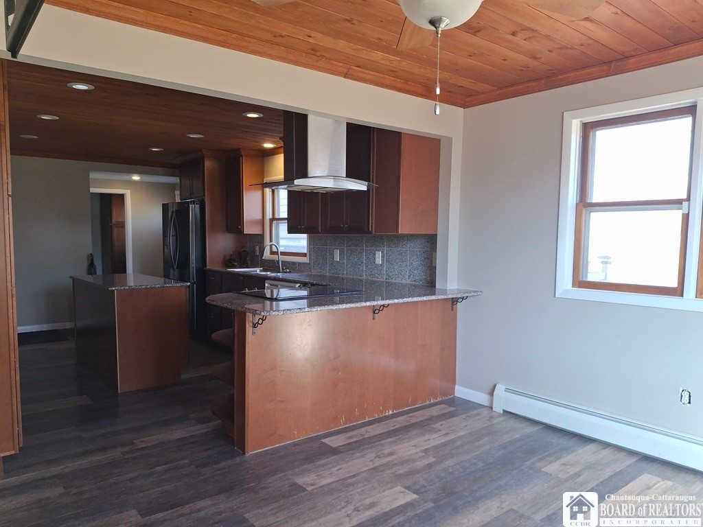 1898 Buffalo Street Olean, NY 14760 - Photo 9 of 34 Breakfast bar dining area.TV Mount on wall to watc