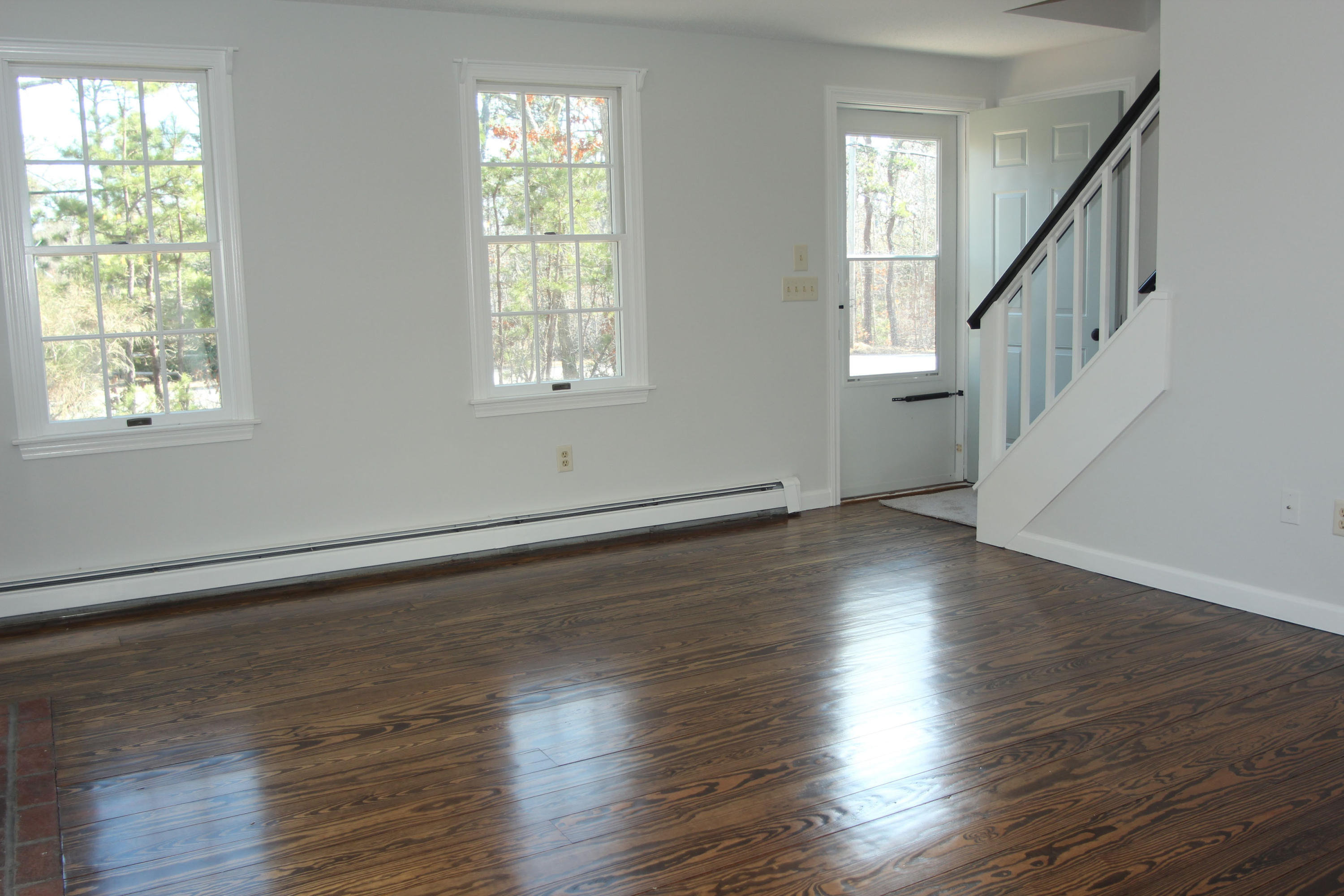 725 School House Road Eastham, MA 02642 - Photo 4 of 35 Living Room to Front Entrrance
