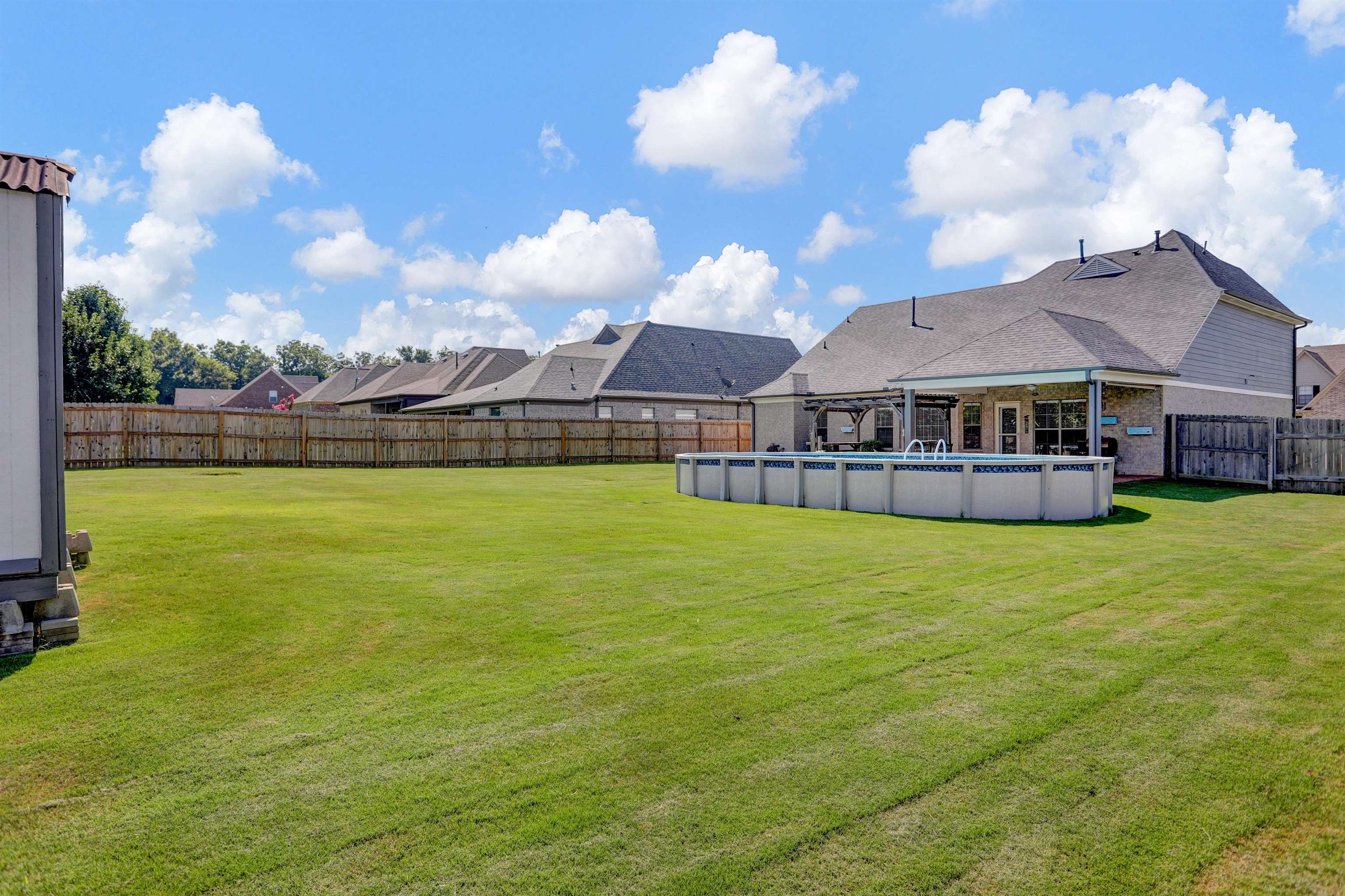 25 Breezy Loop Oakland, TN 38060 - Photo 19 of 19 a view of a house with a big yard