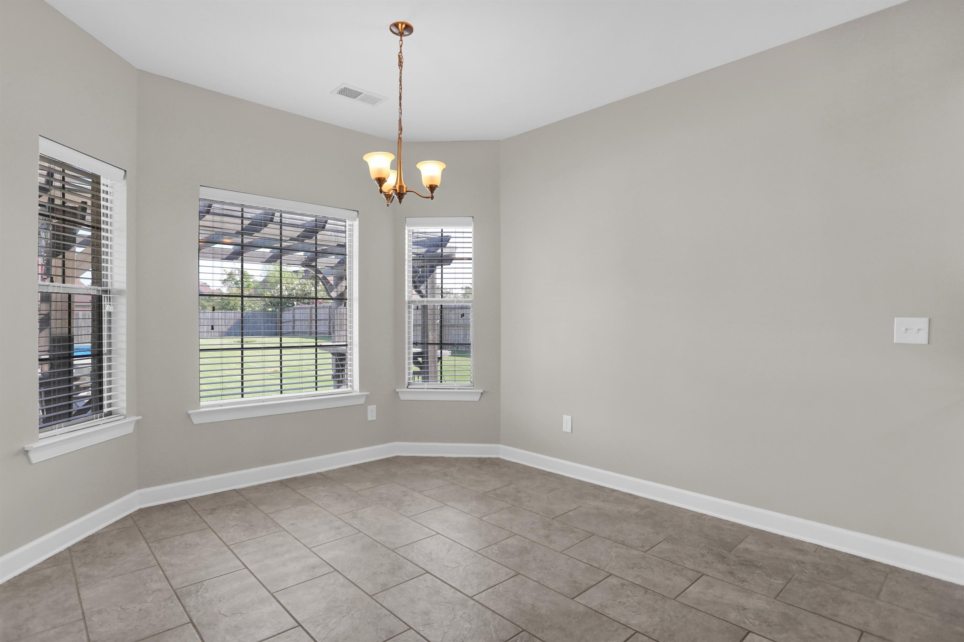 25 Breezy Loop Oakland, TN 38060 - Photo 7 of 19 a view of an empty room with a window