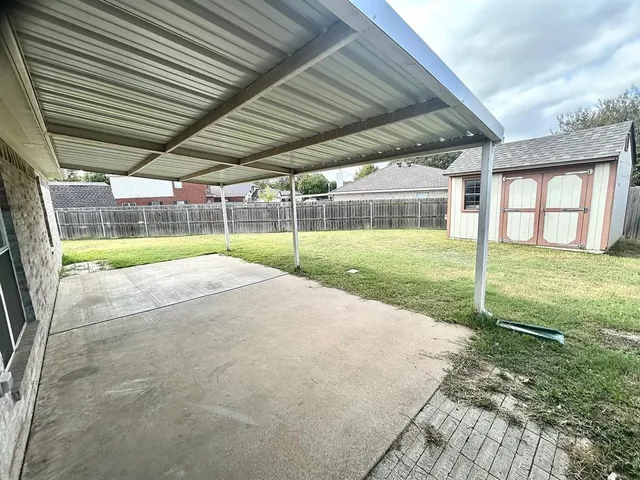 a view of a backyard of a house