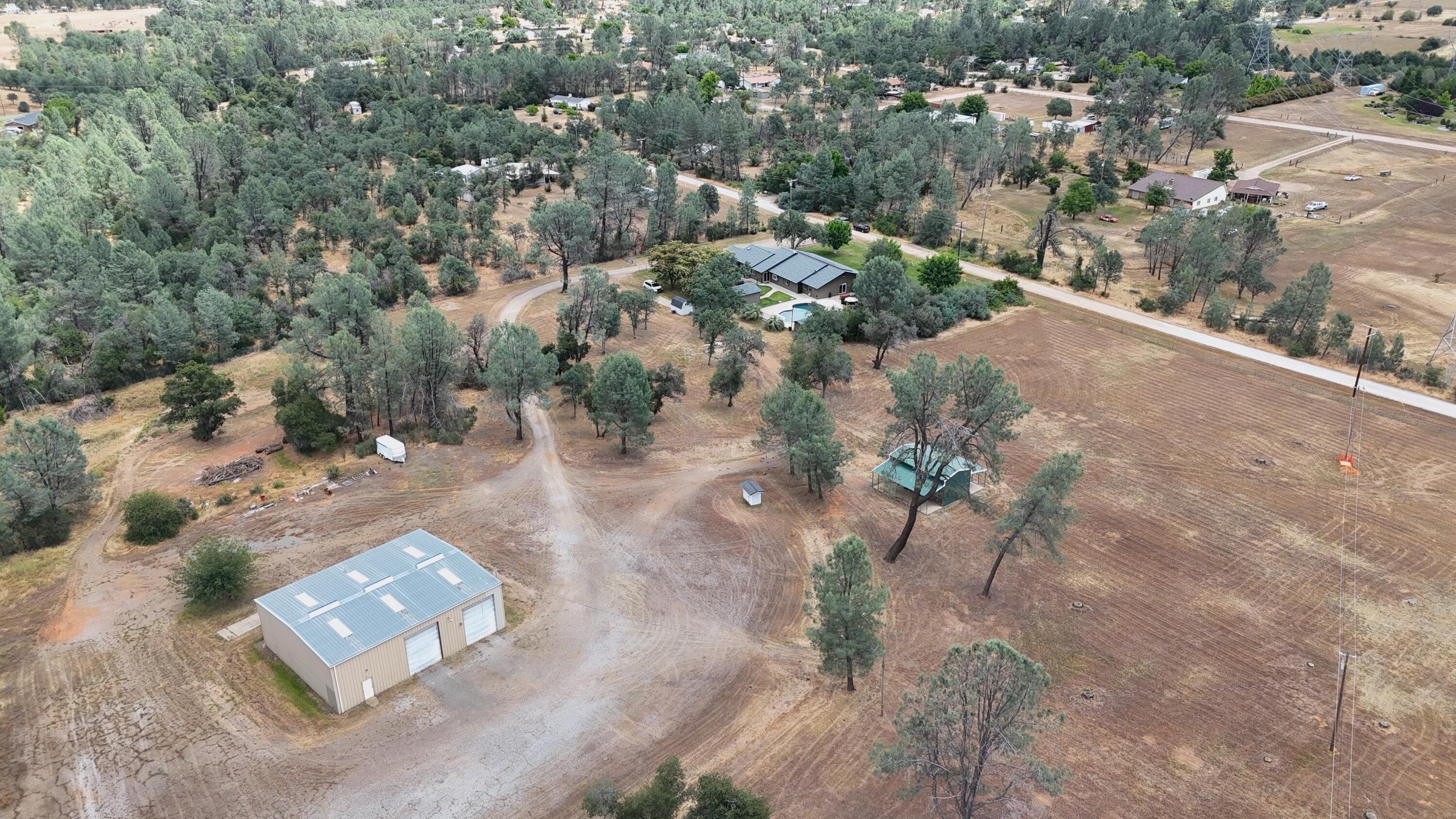 17536 Oly Way Anderson, CA 96007 - Photo 50 of 51 an aerial view of a house with a yard
