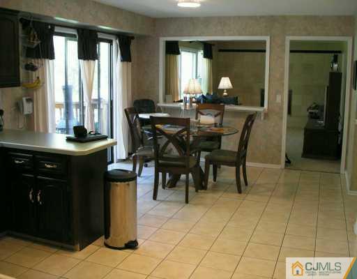21 Thomas Road East Brunswick, NJ 08816 - Photo 7 of 8 a dining room with furniture and window