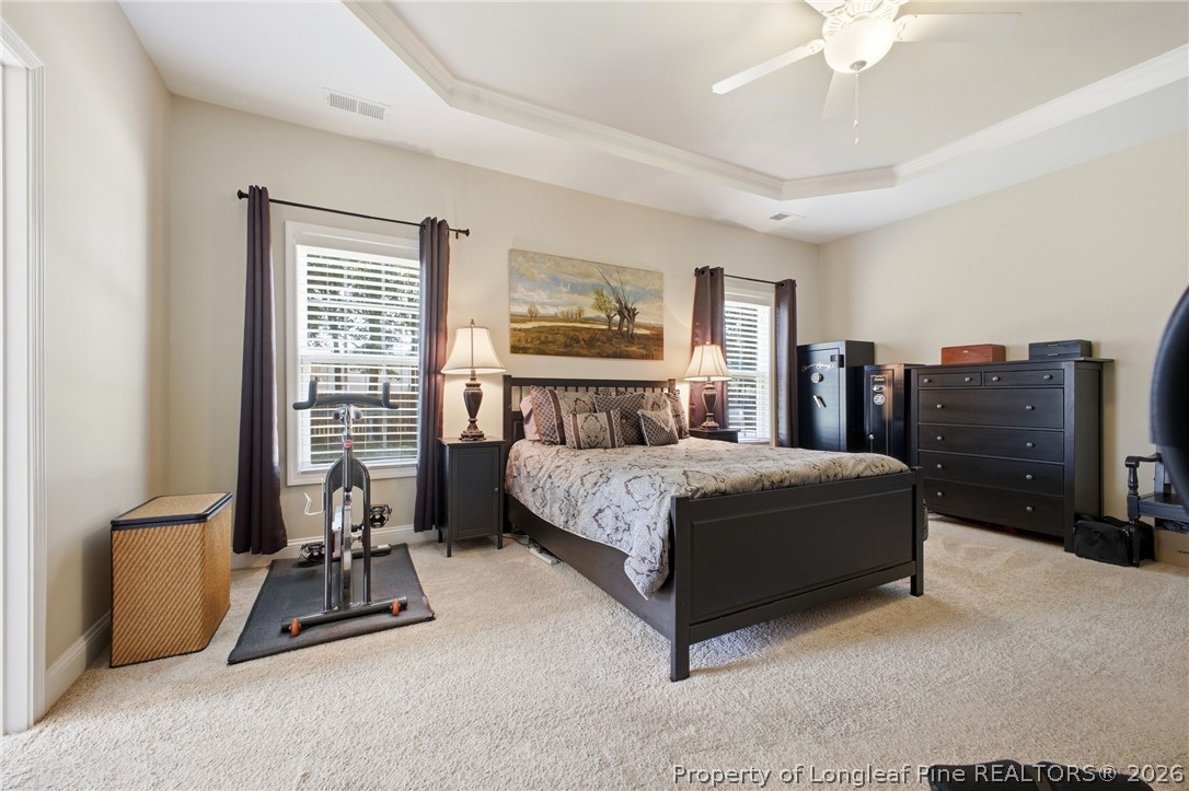 2589 June Johnson Road Raeford, NC 28376 - Photo 17 of 49 a bedroom with a bed a table and chair