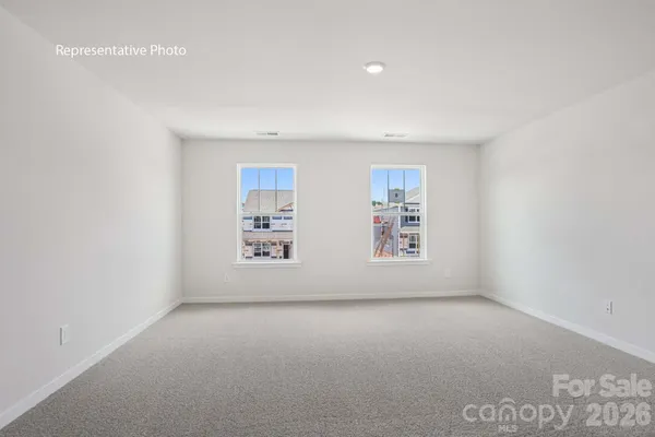 a bathroom with a double vanity sink and mirror