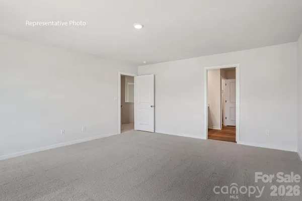 a bathroom with a sink double vanity and a mirror