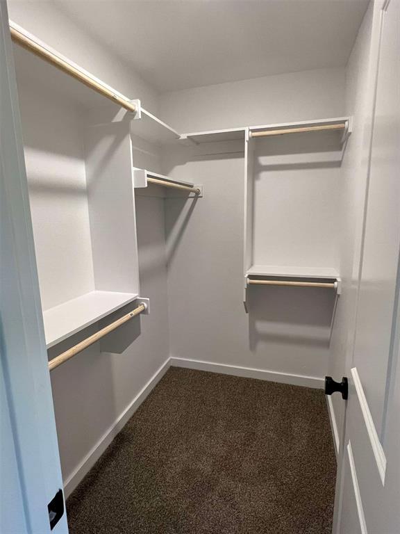 2526 South Fannin Avenue Denison, TX 75020 - Photo 16 of 20 a view of an empty walk in closet
