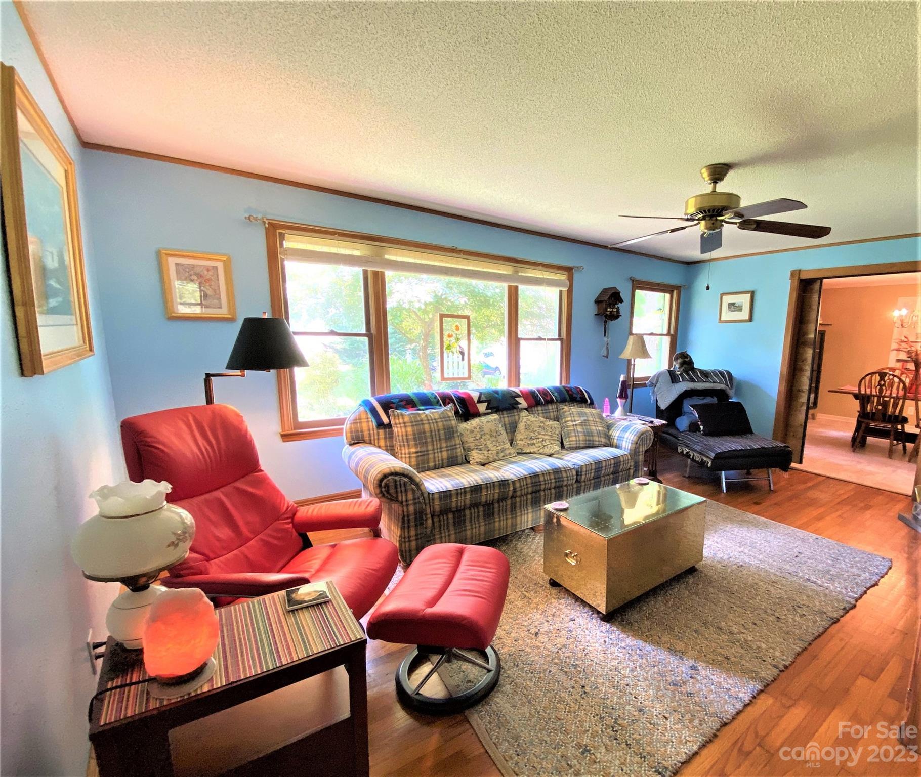 1203 Zeb Helms Road Monroe, NC 28112 - Photo 18 of 46 a living room with furniture a rug and a window
