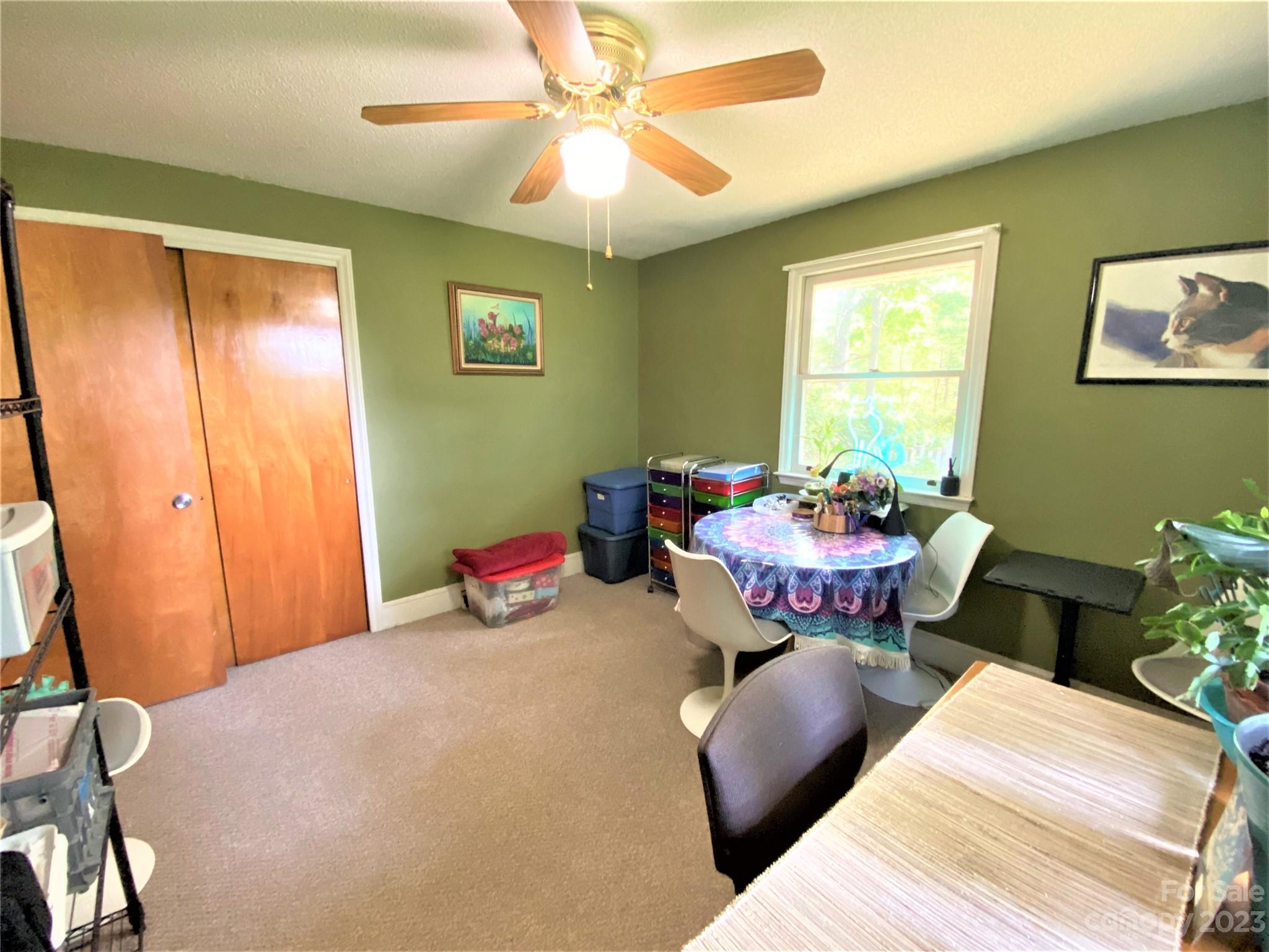 1203 Zeb Helms Road Monroe, NC 28112 - Photo 28 of 46 a bedroom with a bed and a table