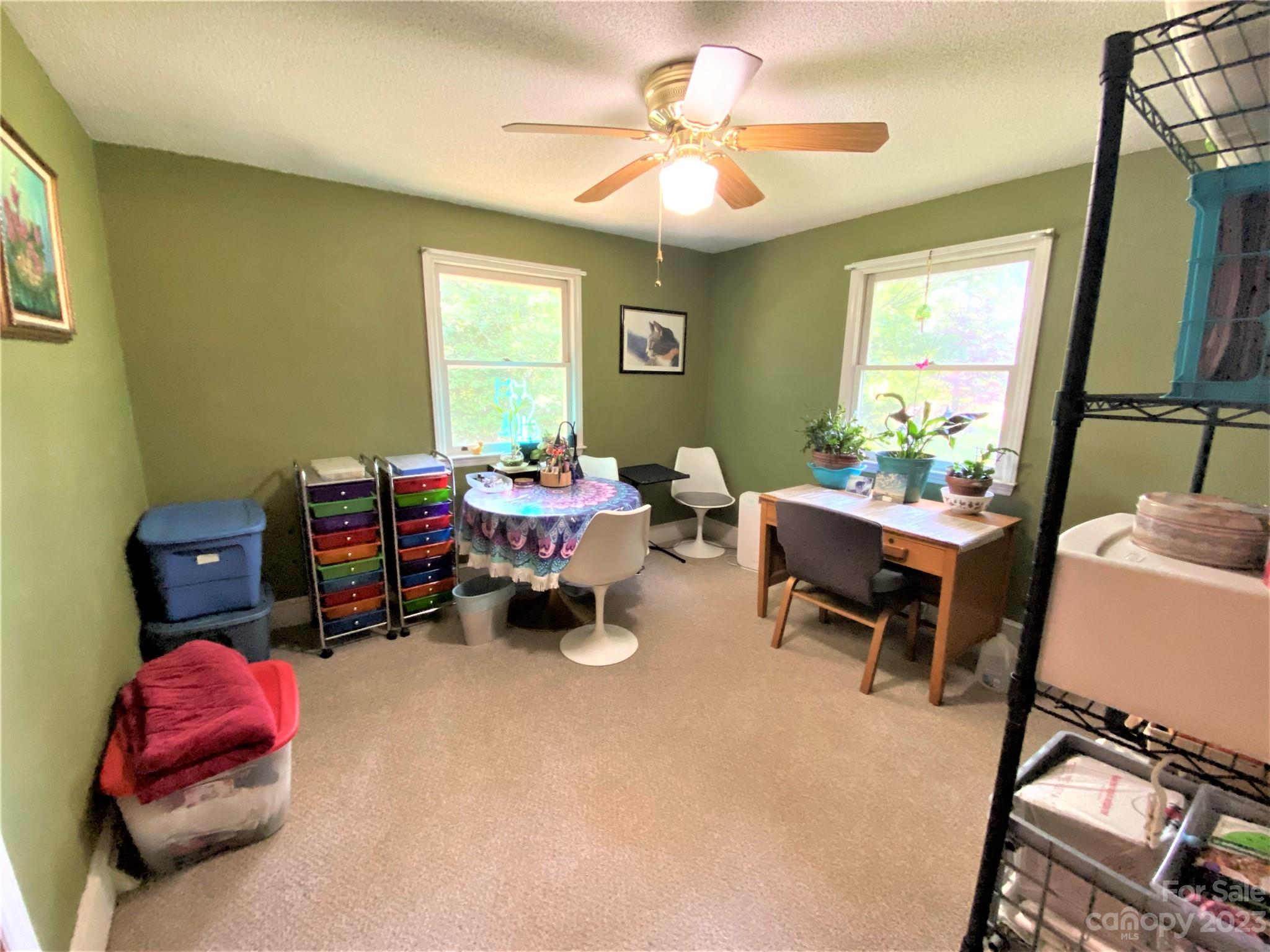 1203 Zeb Helms Road Monroe, NC 28112 - Photo 30 of 46 a living room with furniture and a window