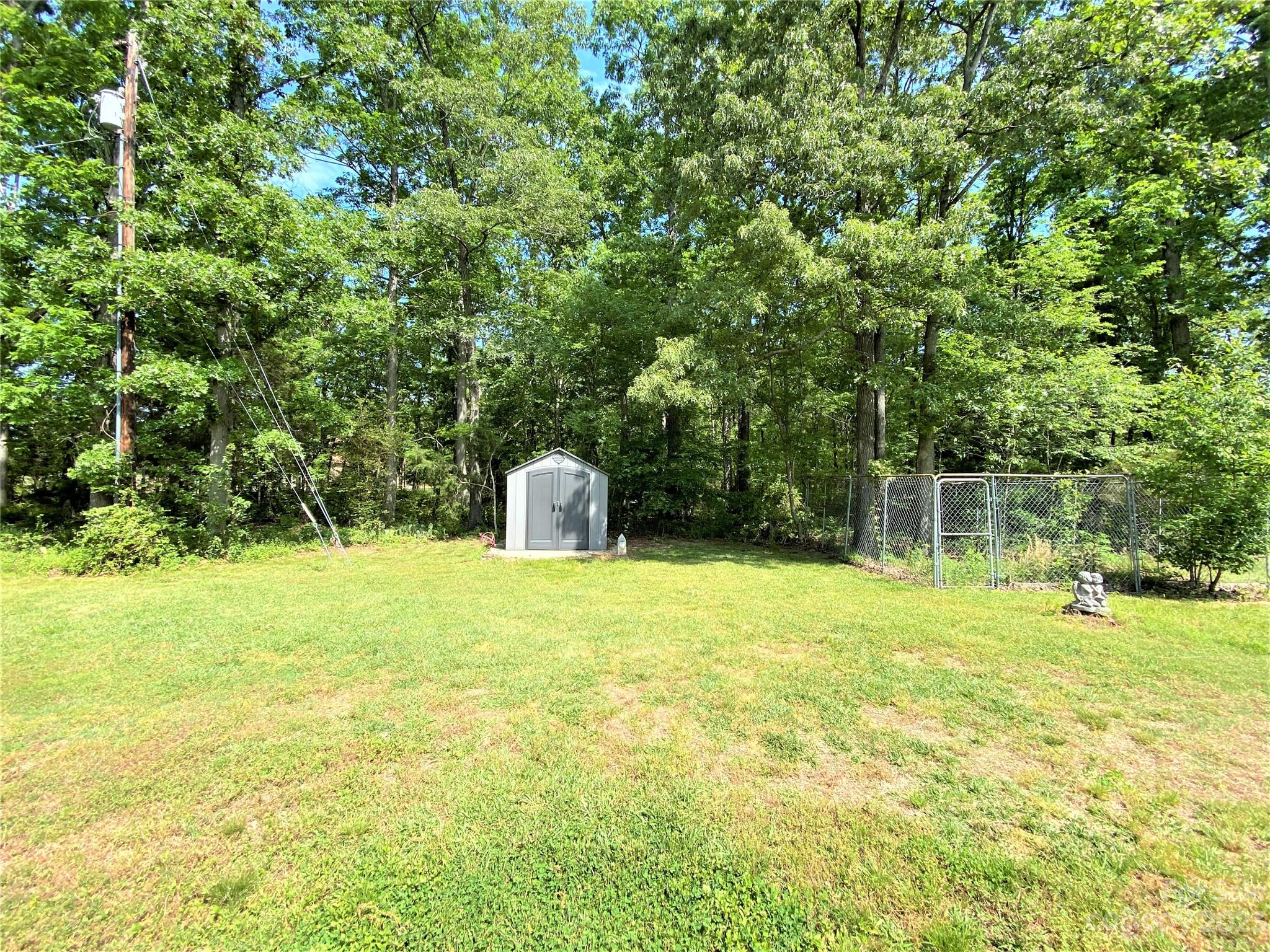 1203 Zeb Helms Road Monroe, NC 28112 - Photo 45 of 46 a view of a trees with a big yard