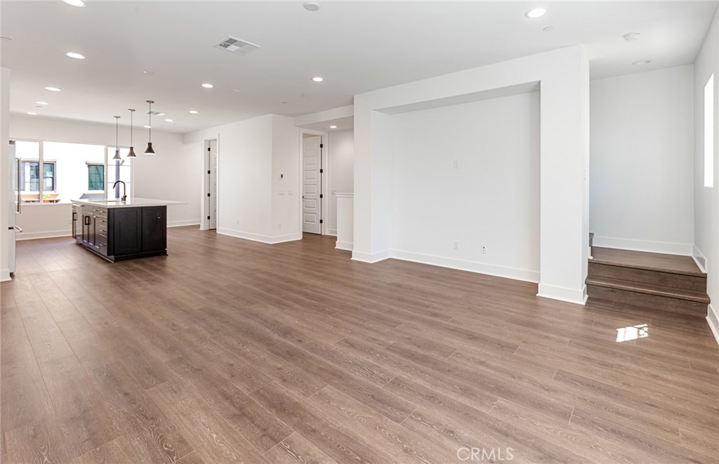 150 Bridle Drive Burbank, CA 91506 - Photo 16 of 36 a view of empty room with wooden floor