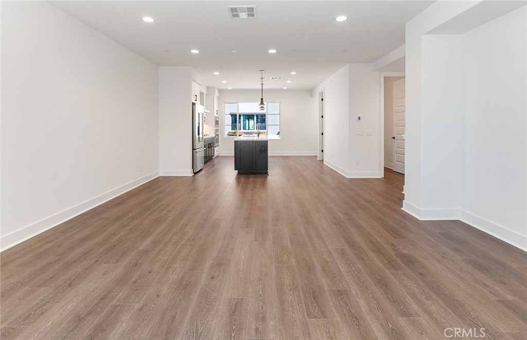 150 Bridle Drive Burbank, CA 91506 - Photo 17 of 36 a view of a kitchen with wooden floor and a window