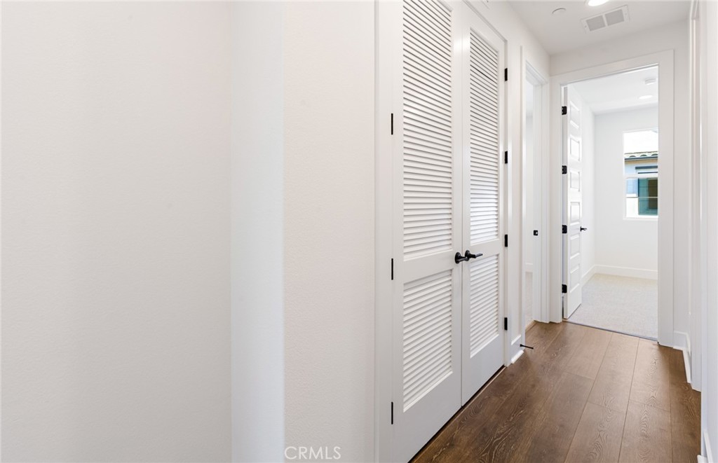 150 Bridle Drive Burbank, CA 91506 - Photo 26 of 36 a view of a hallway with wooden floor