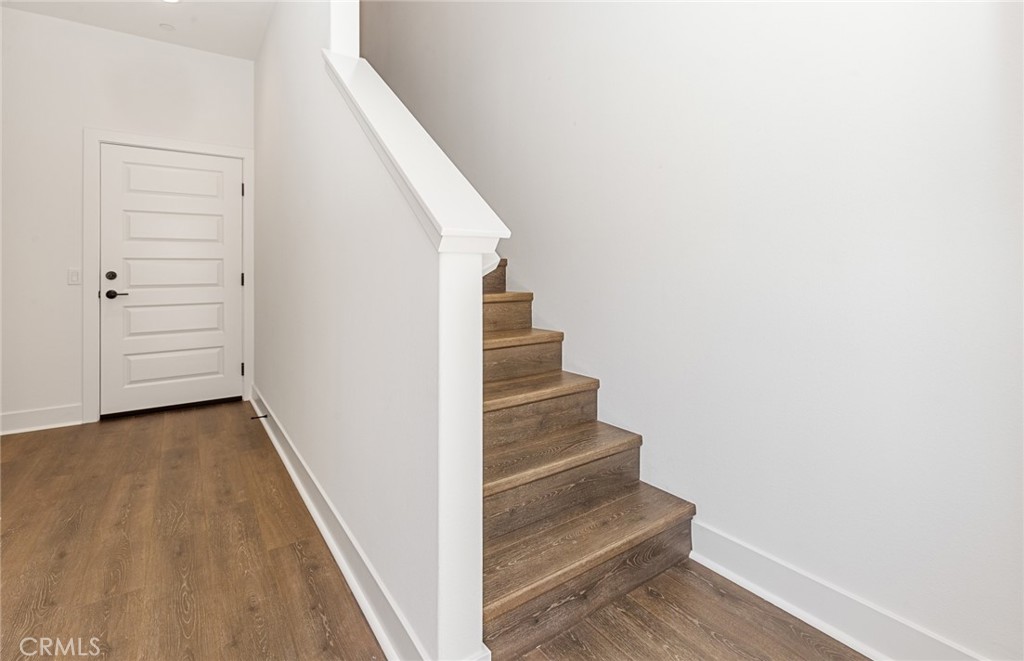 150 Bridle Drive Burbank, CA 91506 - Photo 6 of 36 a view of entryway and hall with wooden floor