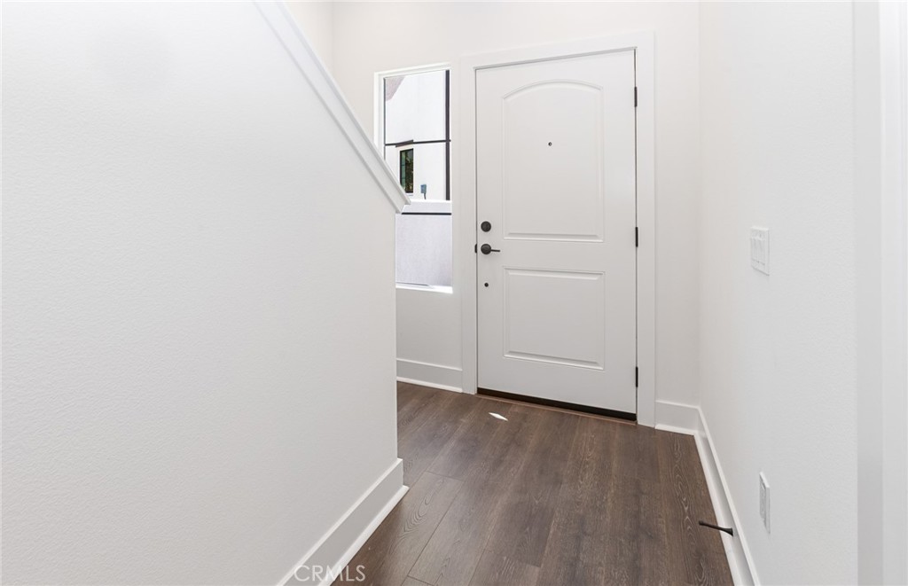 150 Bridle Drive Burbank, CA 91506 - Photo 8 of 36 a view of a hallway with wooden floor