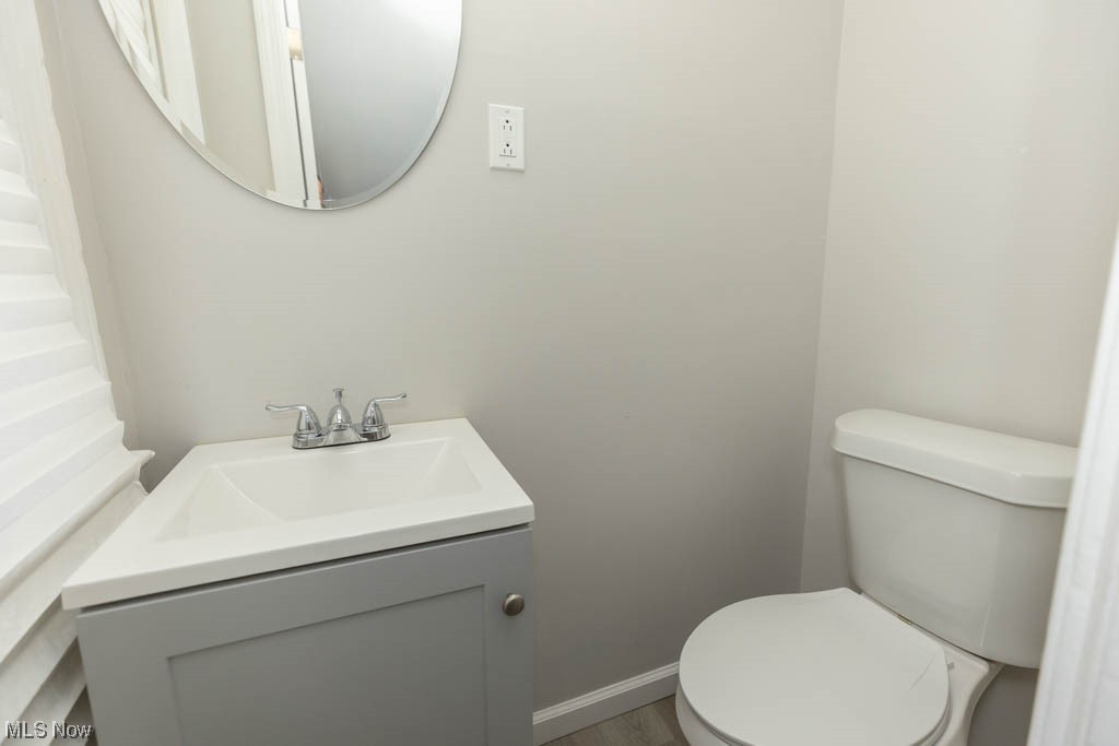 3890 Wallingford Road South Euclid, OH 44121 - Photo 10 of 19 Bathroom with toilet and vanity