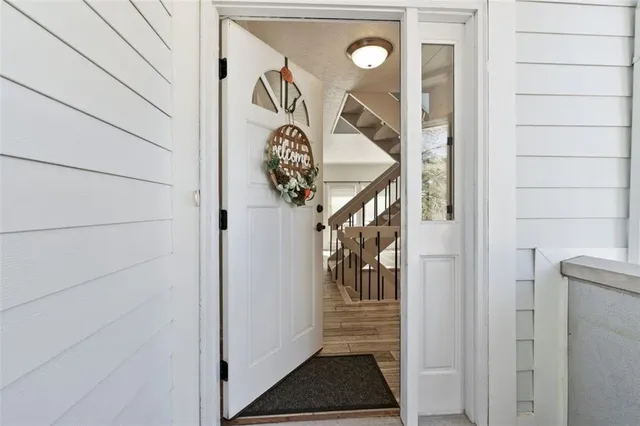 a view of a door and a window