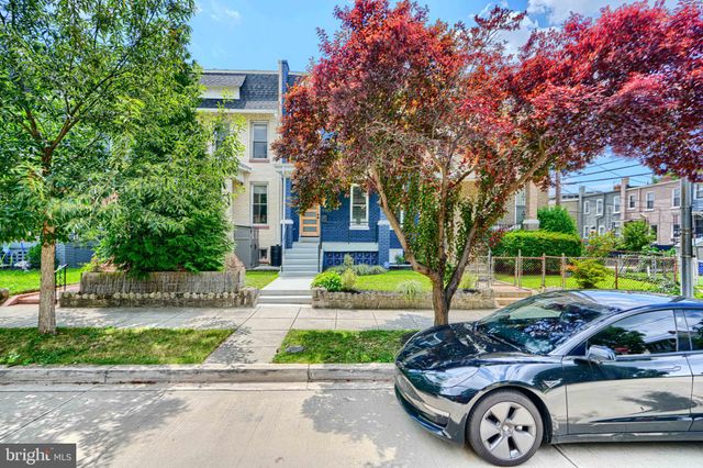 a view of a balcony with wooden floor