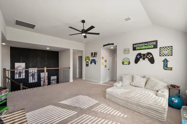 a spacious bedroom with a bed and a walk in closet