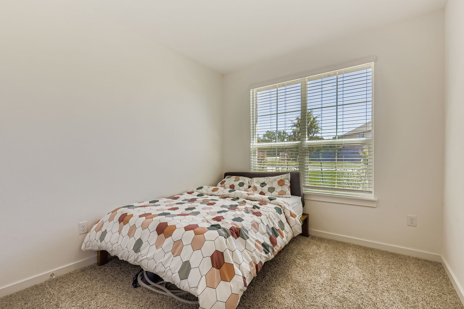 1909 Ruger Pass Leander, TX 78641 - Photo 15 of 31 Bedroom featuring carpet