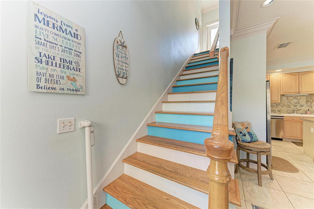 4003 5th Avenue Holmes Beach, FL 34217 - Photo 28 of 56 a view of entryway and hall with wooden floor