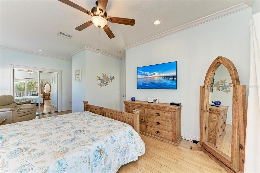 4003 5th Avenue Holmes Beach, FL 34217 - Photo 32 of 56 a bedroom with two beds and a dresser