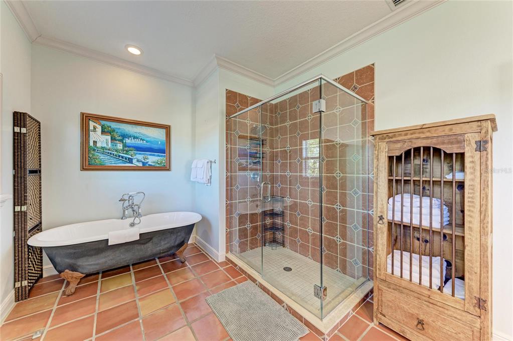 4003 5th Avenue Holmes Beach, FL 34217 - Photo 34 of 56 a living room with a glass door and a table