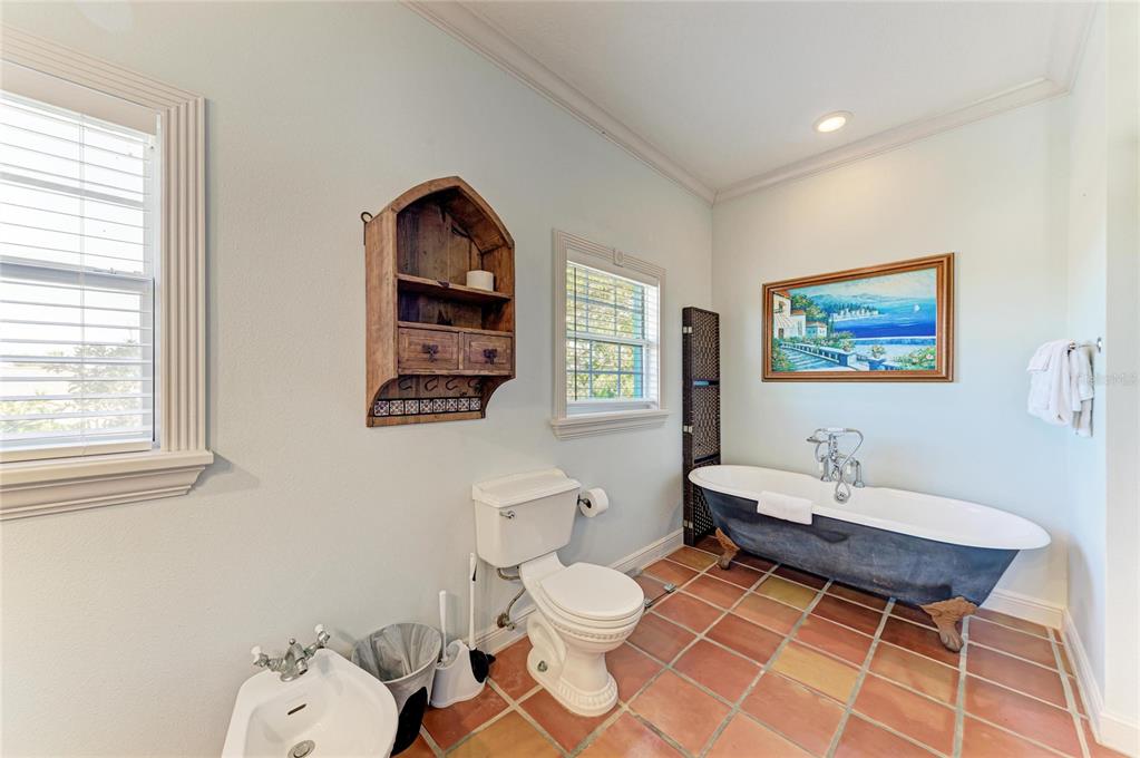 4003 5th Avenue Holmes Beach, FL 34217 - Photo 35 of 56 a living room with a couch and a table