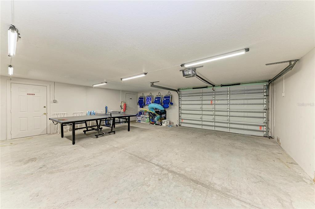 4003 5th Avenue Holmes Beach, FL 34217 - Photo 46 of 56 a view of a livingroom with furniture and a potted plant