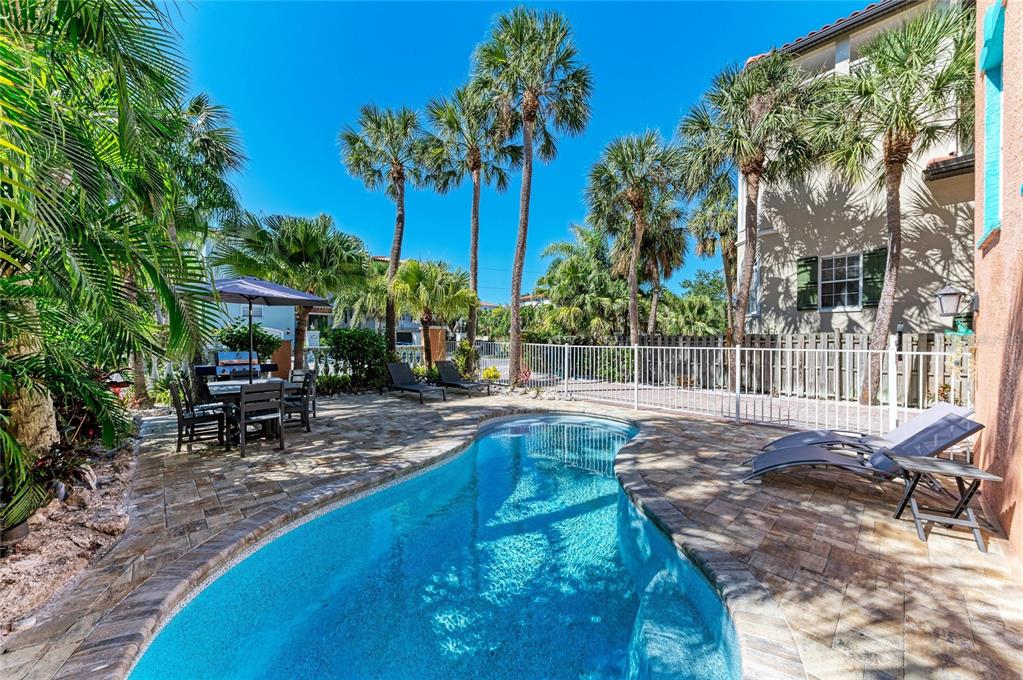 4003 5th Avenue Holmes Beach, FL 34217 - Photo 48 of 56 a view of a house with backyard porch and sitting area