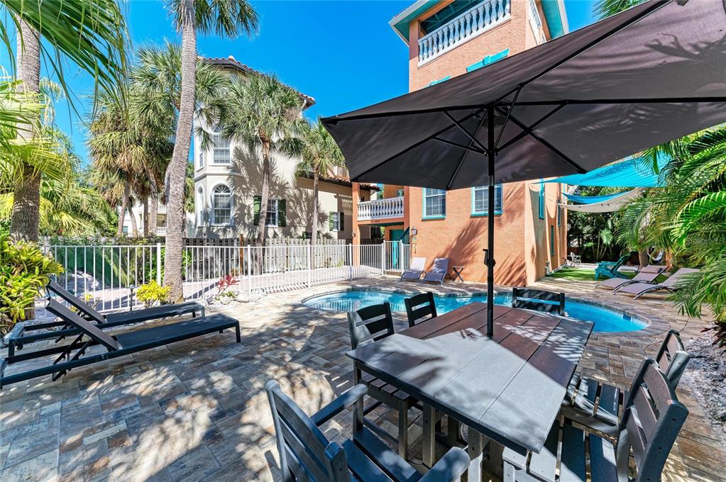 4003 5th Avenue Holmes Beach, FL 34217 - Photo 50 of 56 a view of outdoor space yard and patio