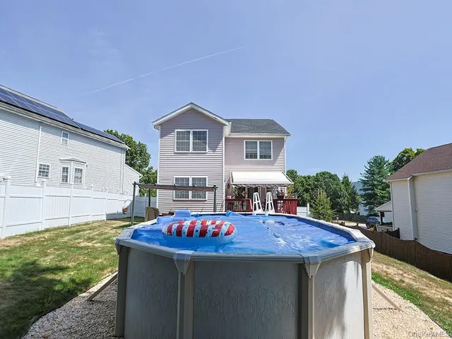 a patio with table and chairs