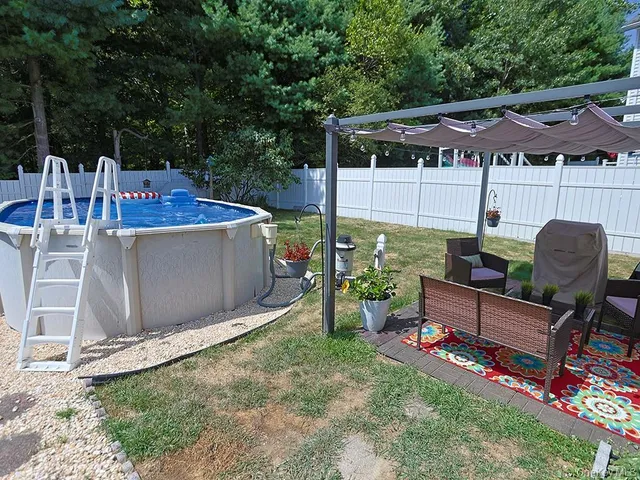 a view of a backyard with plants