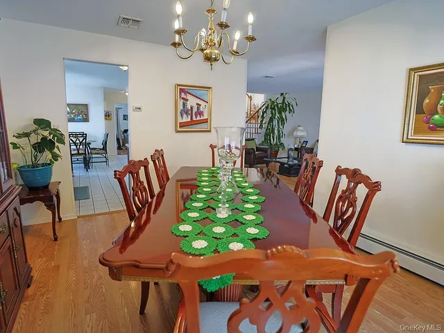 a view of a dining room with furniture