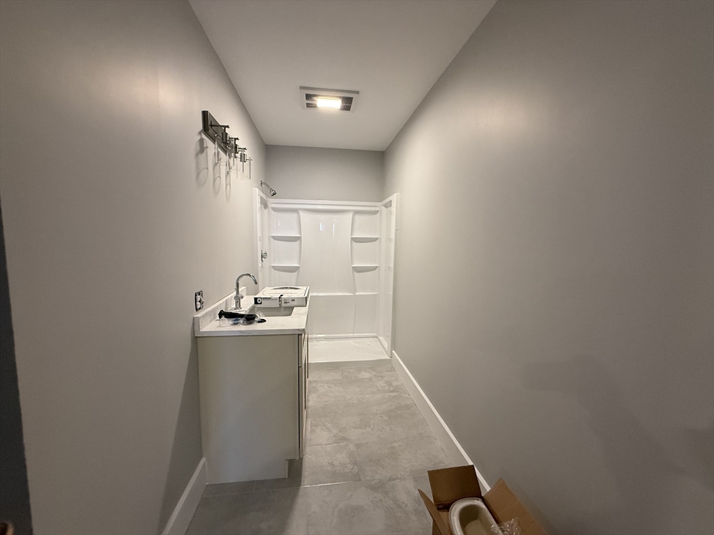 237 Park Avenue, Unit 3 Worcester, MA 01609 - Photo 20 of 20 a kitchen with refrigerator and window