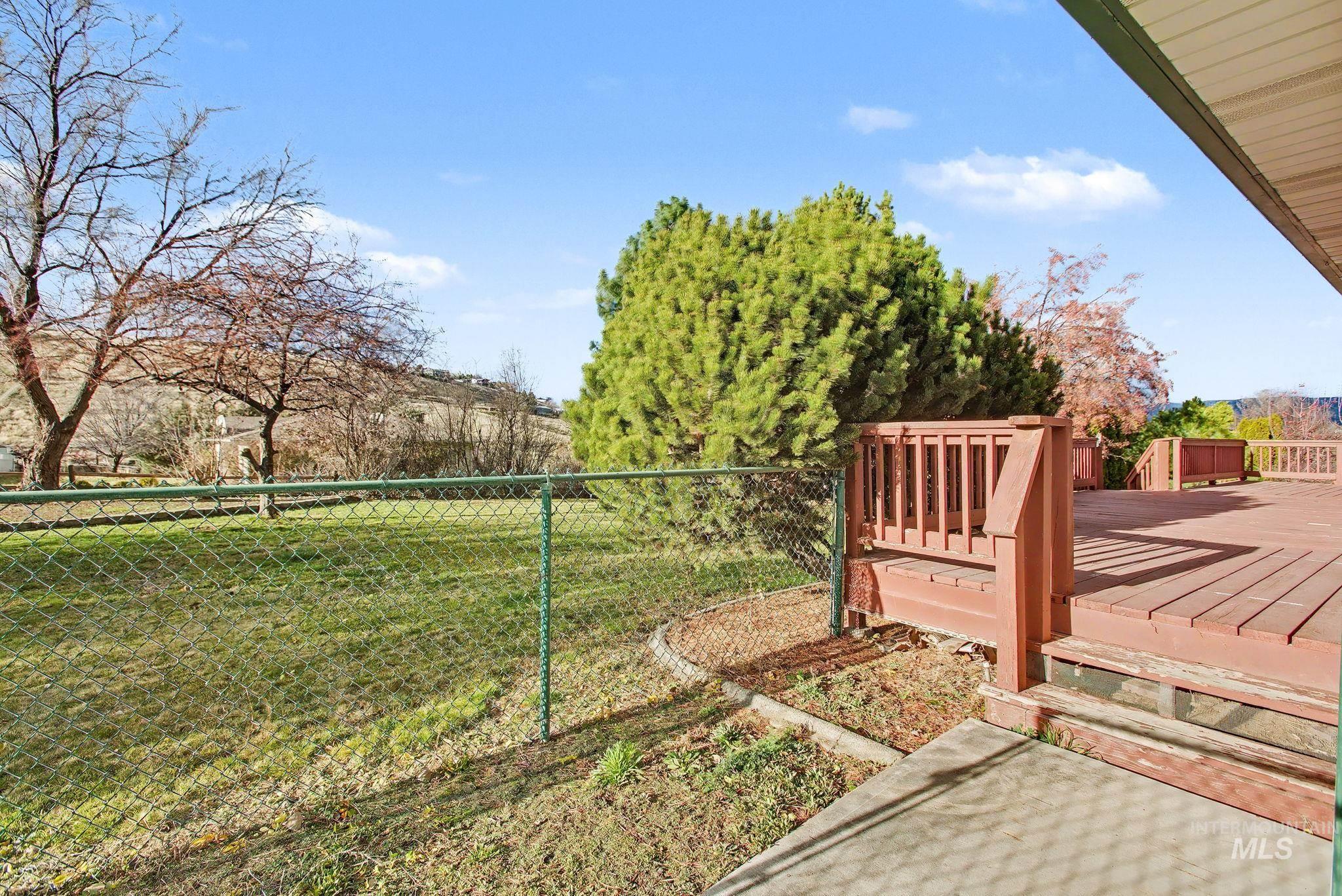 2242 Chukar Lane Clarkston, WA 99403 - Photo 35 of 41 View of yard featuring a deck