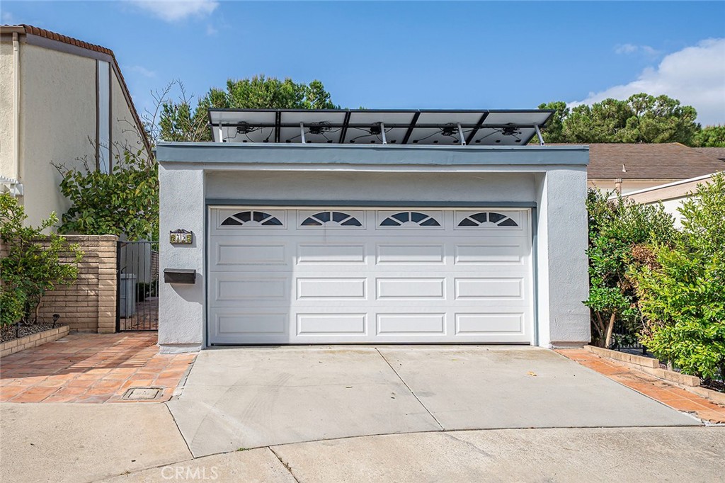 75 Willow Tree Lane Irvine, CA 92612 - Photo 48 of 49 a black and white building with black door